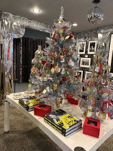 Dustin Pittman’s New York After Dark books under the Christmas tree at Eerdmans Fourth Annual Holiday Bazaar