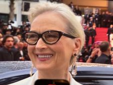 What’s not to smile about? Meryl Streep feels the love from the Cannes crowds who braved the rain clouds at the opening of the Cannes Film Festival